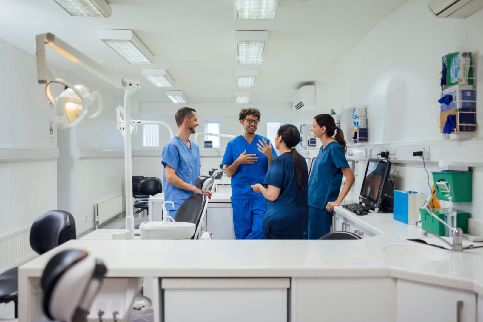Doctors having a discussion in a clinic.